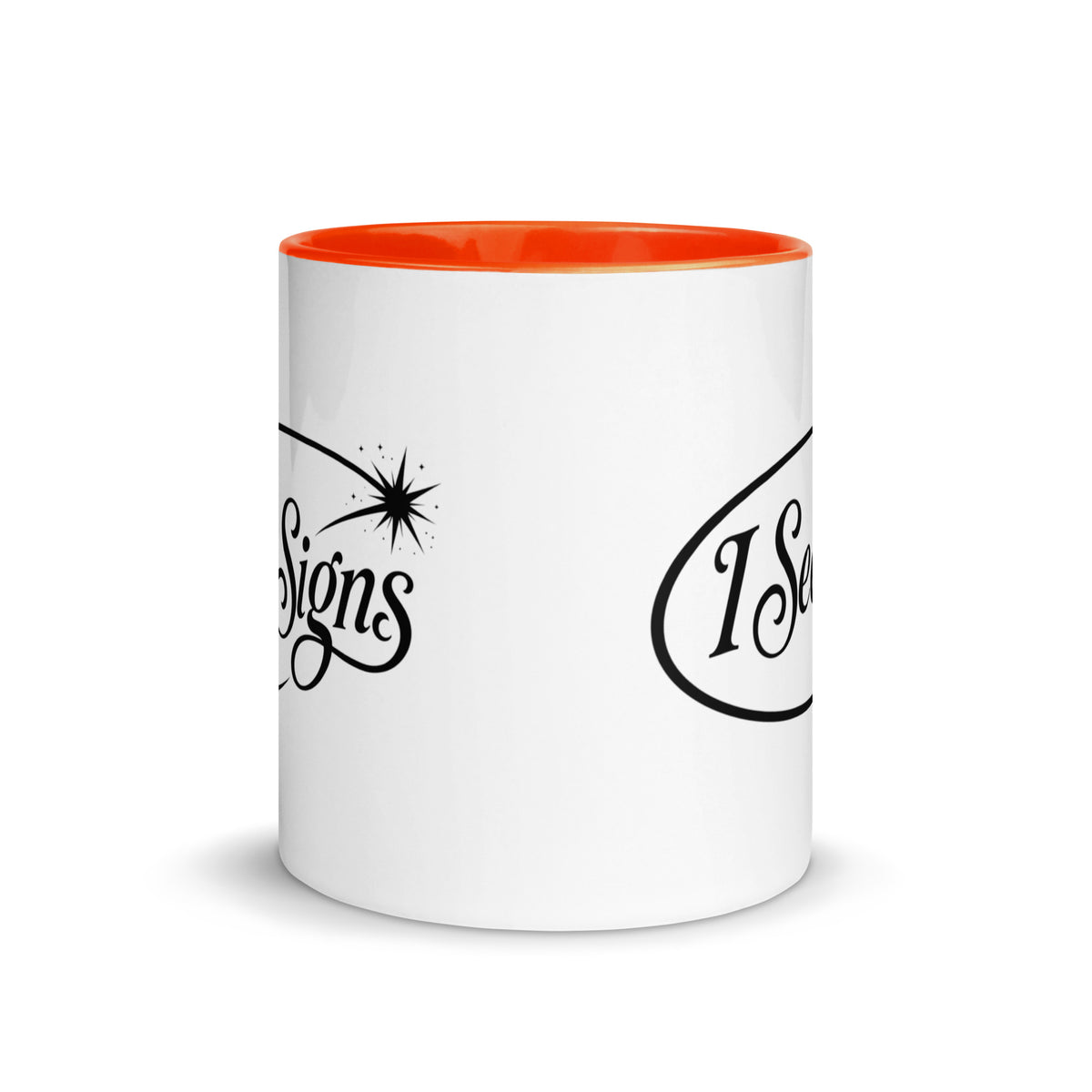 I See Signs design, the words set in black script inside a thin oval with a four-pointed star, on a white ceramic mug with an orange interior, 11 oz, front view
