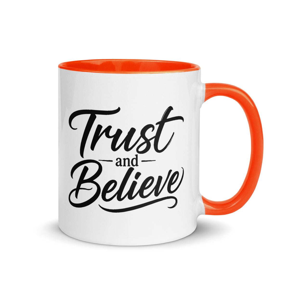 Trust and Believe design, on a white ceramic mug with an orange interior, 11 oz, right side view