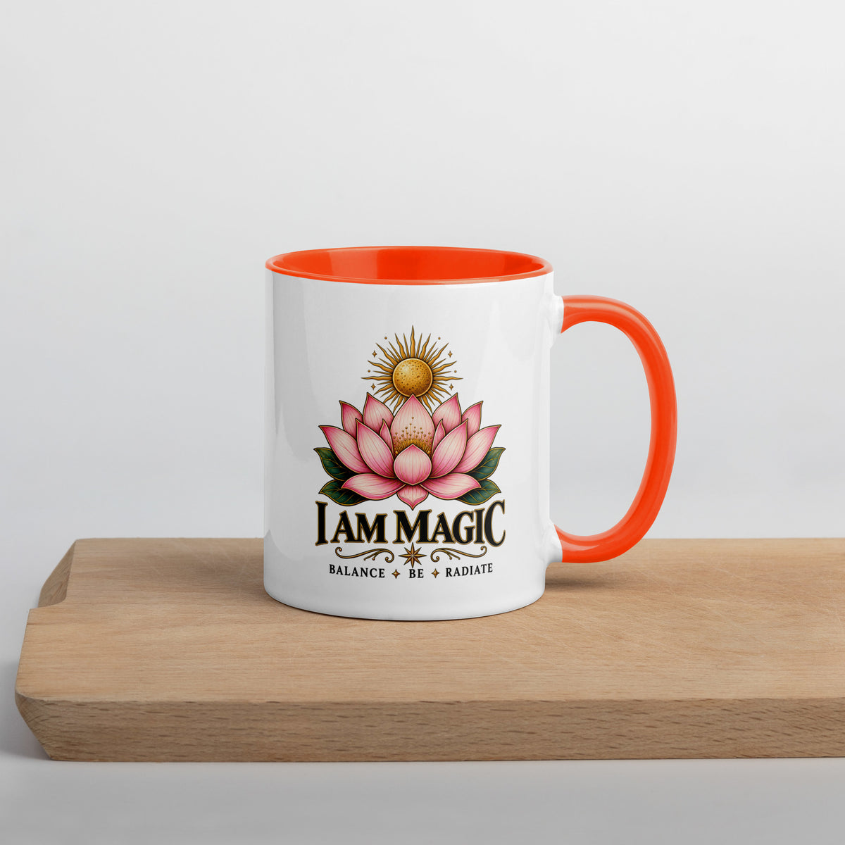 I Am Magic design with a gold lotus, Be Magical collection, on a white ceramic mug with an orange interior, 11 oz, right side view
