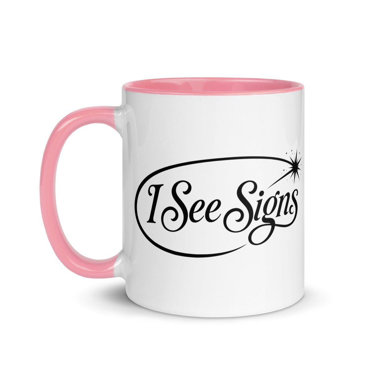 I See Signs design, the words set in black script inside a thin oval with a four-pointed star, on a white ceramic mug with a pink interior, 11 oz, left side view