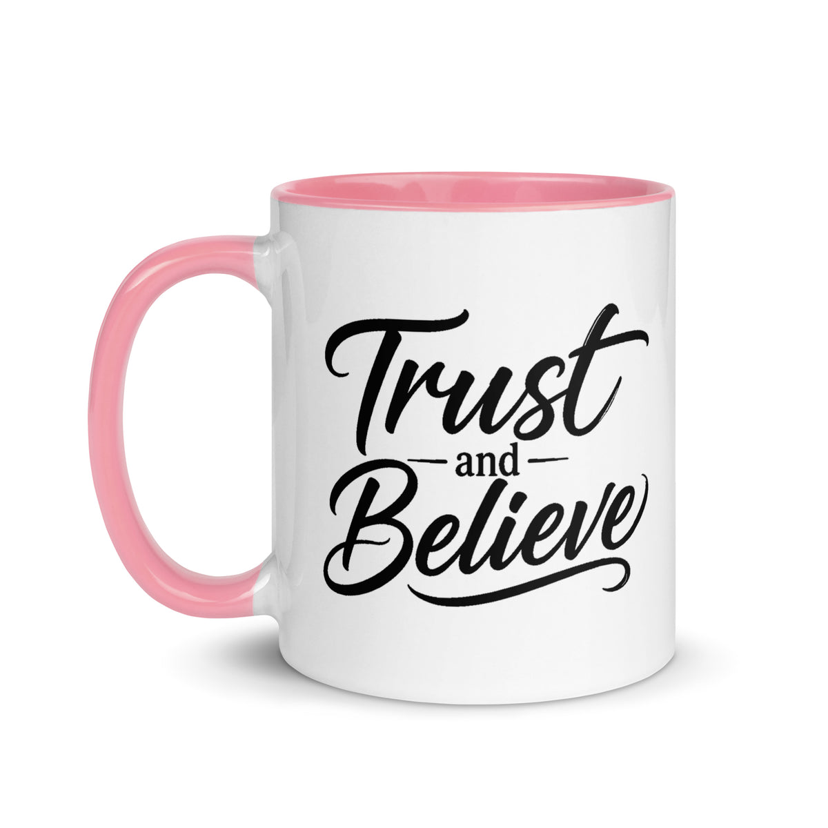 Trust and Believe design, on a white ceramic mug with a pink interior, 11 oz, left side view