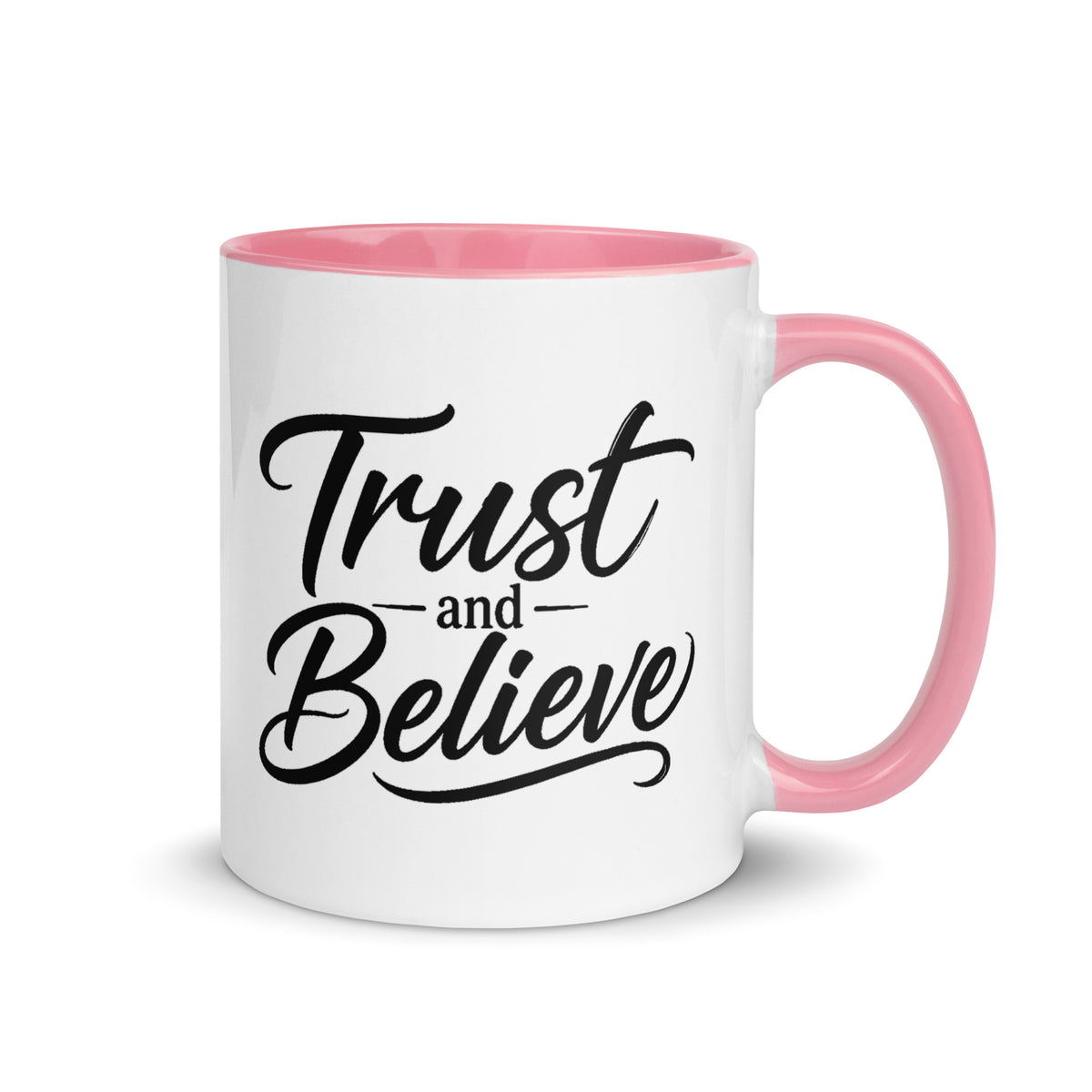 Trust and Believe design, on a white ceramic mug with a pink interior, 11 oz, right side view