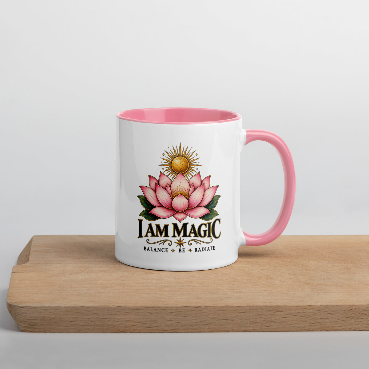 I Am Magic design with a gold lotus, Be Magical collection, on a white ceramic mug with a pink interior, 11 oz, right side view