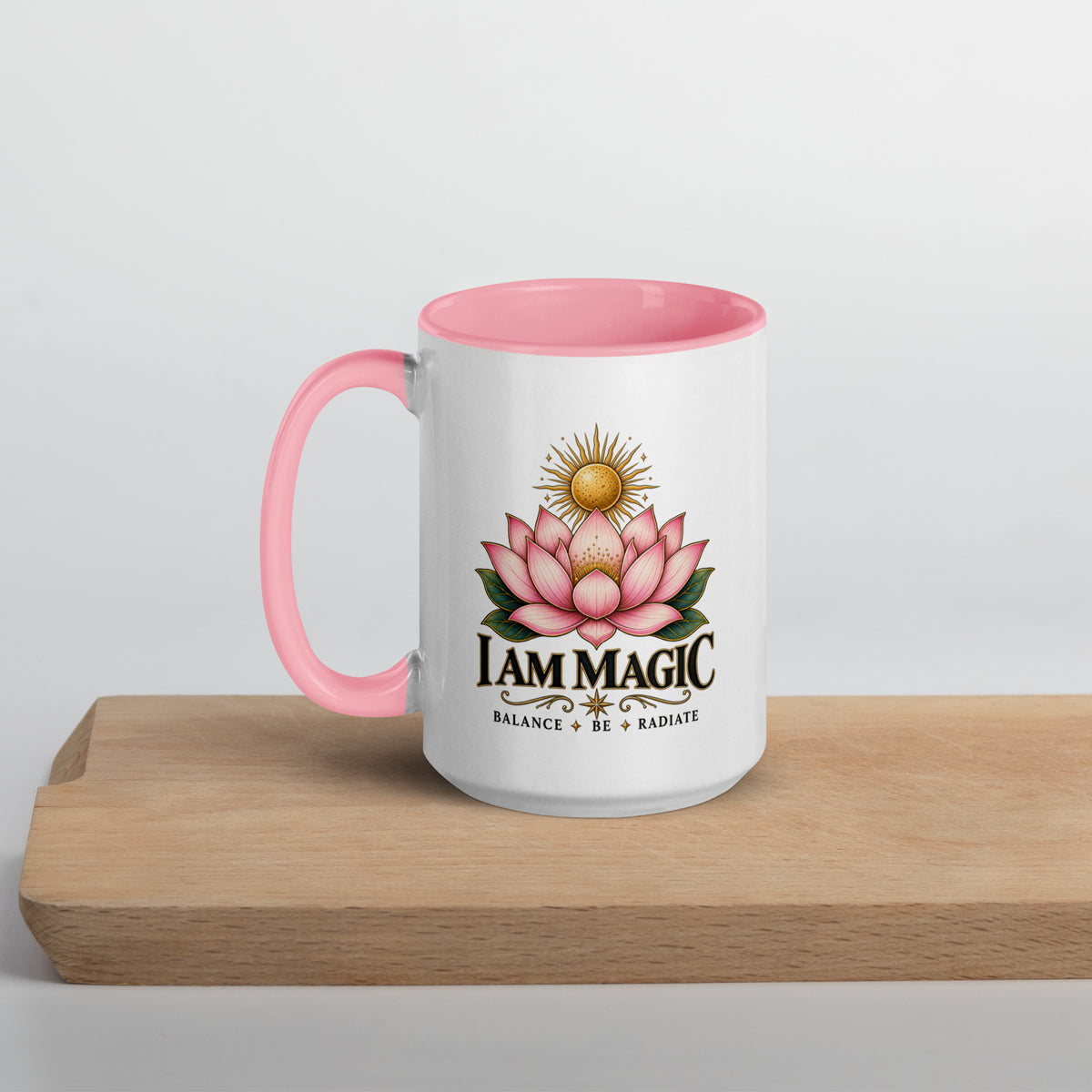 I Am Magic design with a gold lotus, Be Magical collection, on a white ceramic mug with a pink interior, 15 oz, left side view
