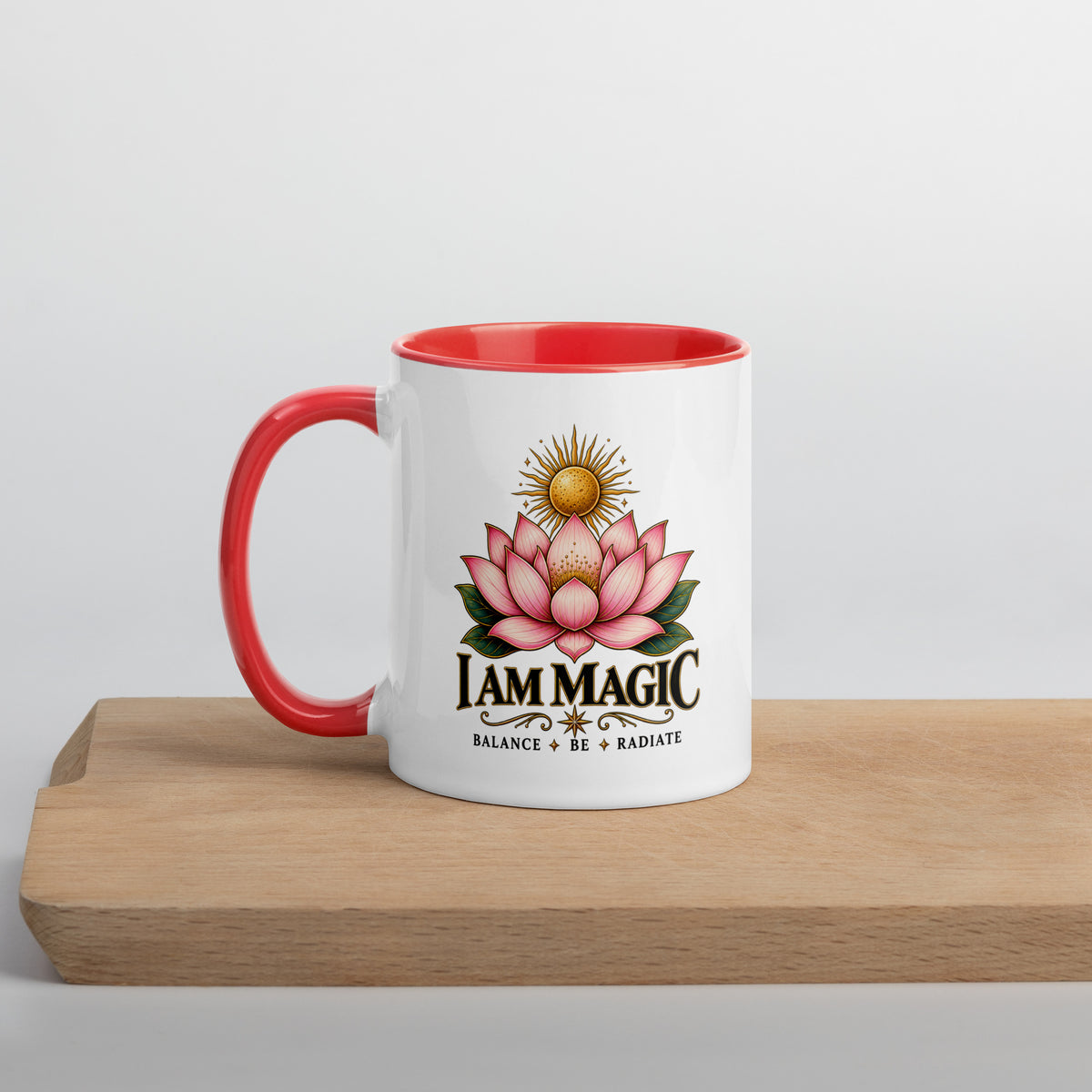 I Am Magic design with a gold lotus, Be Magical collection, on a white ceramic mug with a red interior, 11 oz, left side view