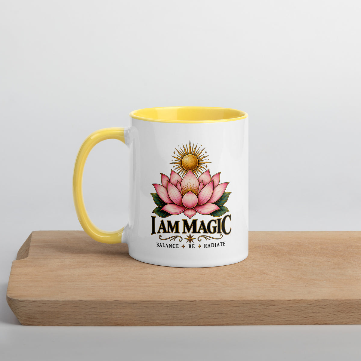 I Am Magic design with a gold lotus, Be Magical collection, on a white ceramic mug with a yellow interior, 11 oz, left side view