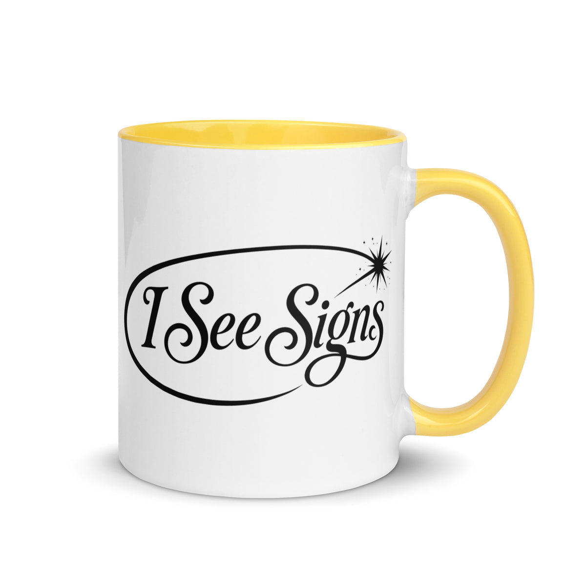 I See Signs design, the words set in black script inside a thin oval with a four-pointed star, on a yellow ceramic mug with color inside, 11 oz, right side view