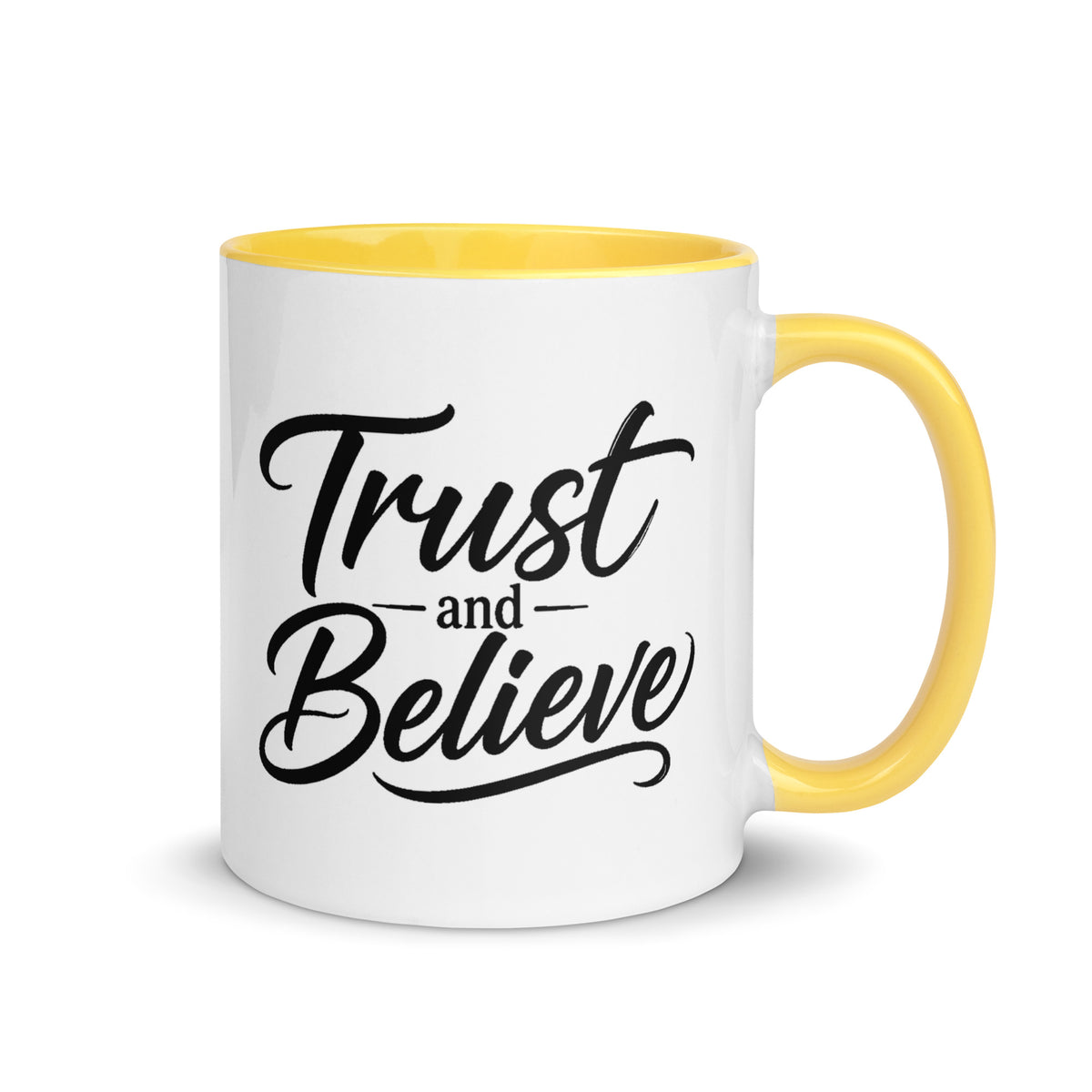 Trust and Believe design, on a white ceramic mug with a yellow interior, 11 oz, right side view