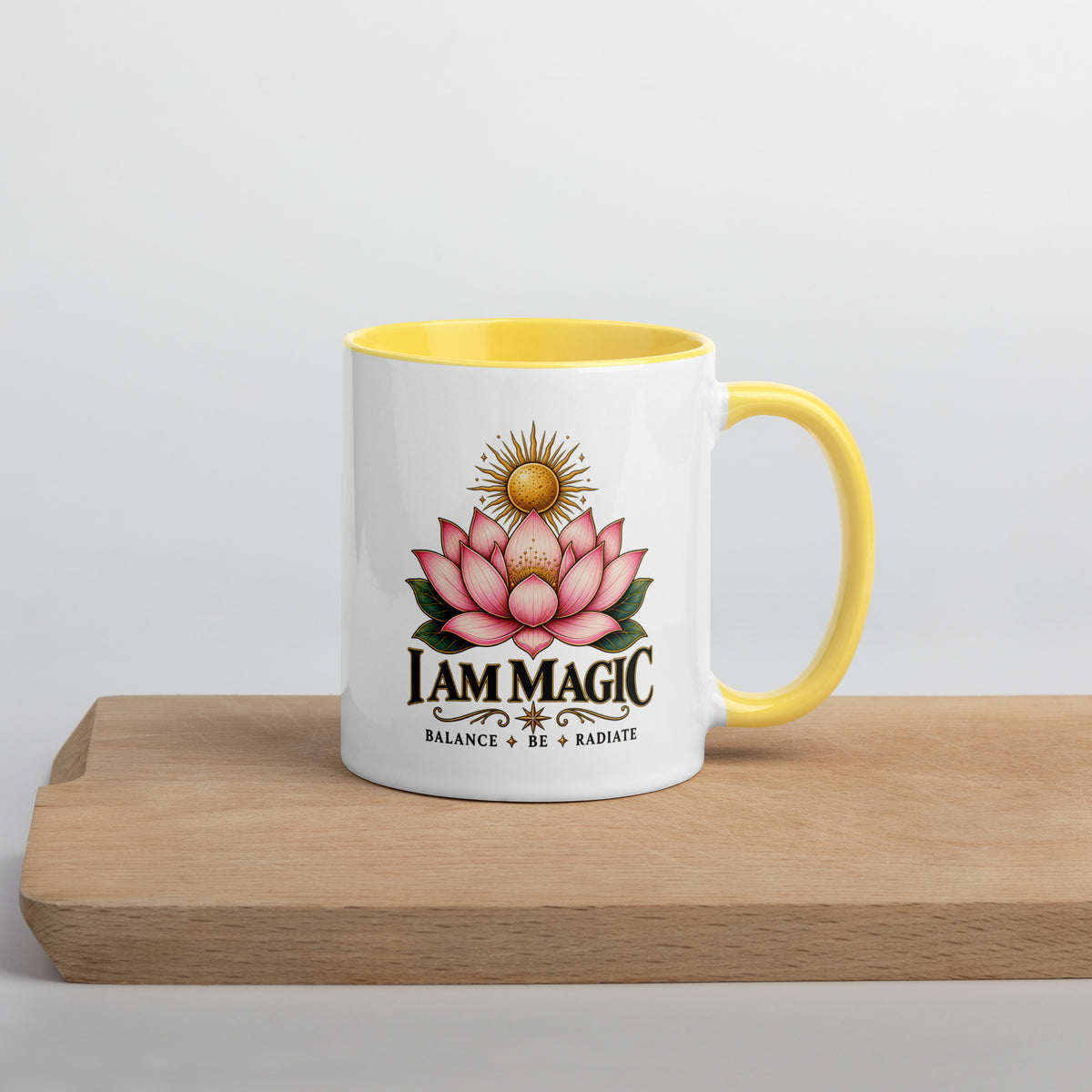I Am Magic design with a gold lotus, Be Magical collection, on a white ceramic mug with a yellow interior, 11 oz, right side view