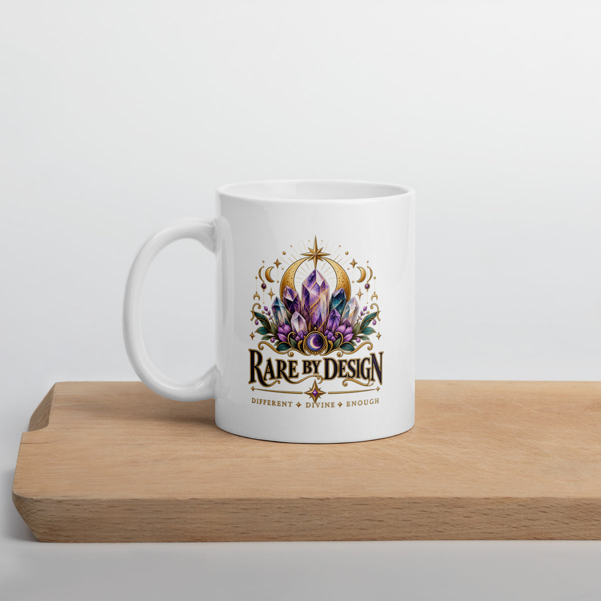 Rare by Design Crystals design, an amethyst cluster, on a white glossy mug, 11 oz, set on a wooden cutting board