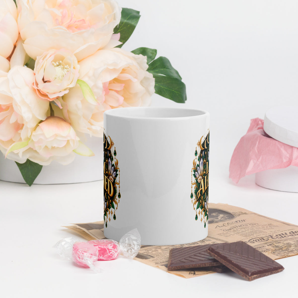 I Am Aligned affirmation design with a lotus, quartz and moon phases in gold, on a white glossy mug, 11 oz, front view