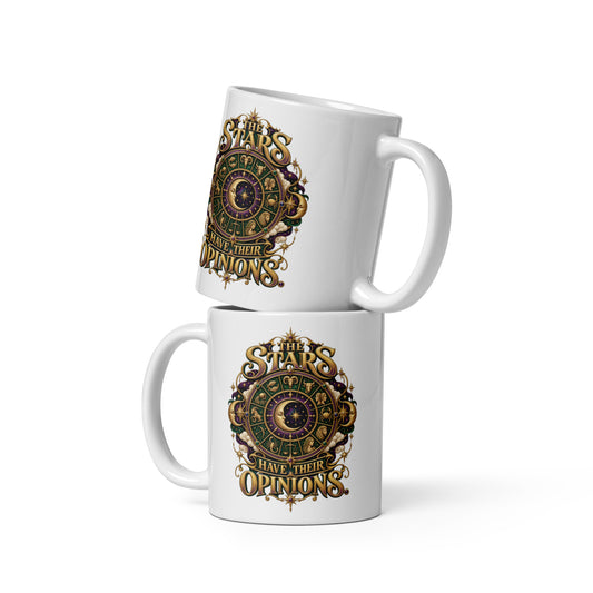 The Stars Have Their Opinions astrology design, a green and purple zodiac wheel of pictorial star signs with a crescent moon and sun face at its center, framed by clouds and gold lettering, on a 11 oz white glossy mug, front view