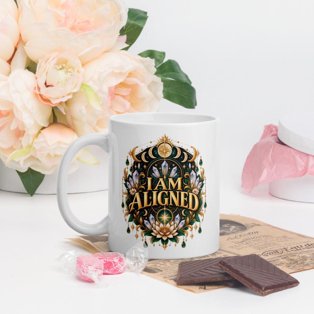 I Am Aligned affirmation design with a lotus, quartz and moon phases in gold, on a white glossy mug, 11 oz, handle on the left