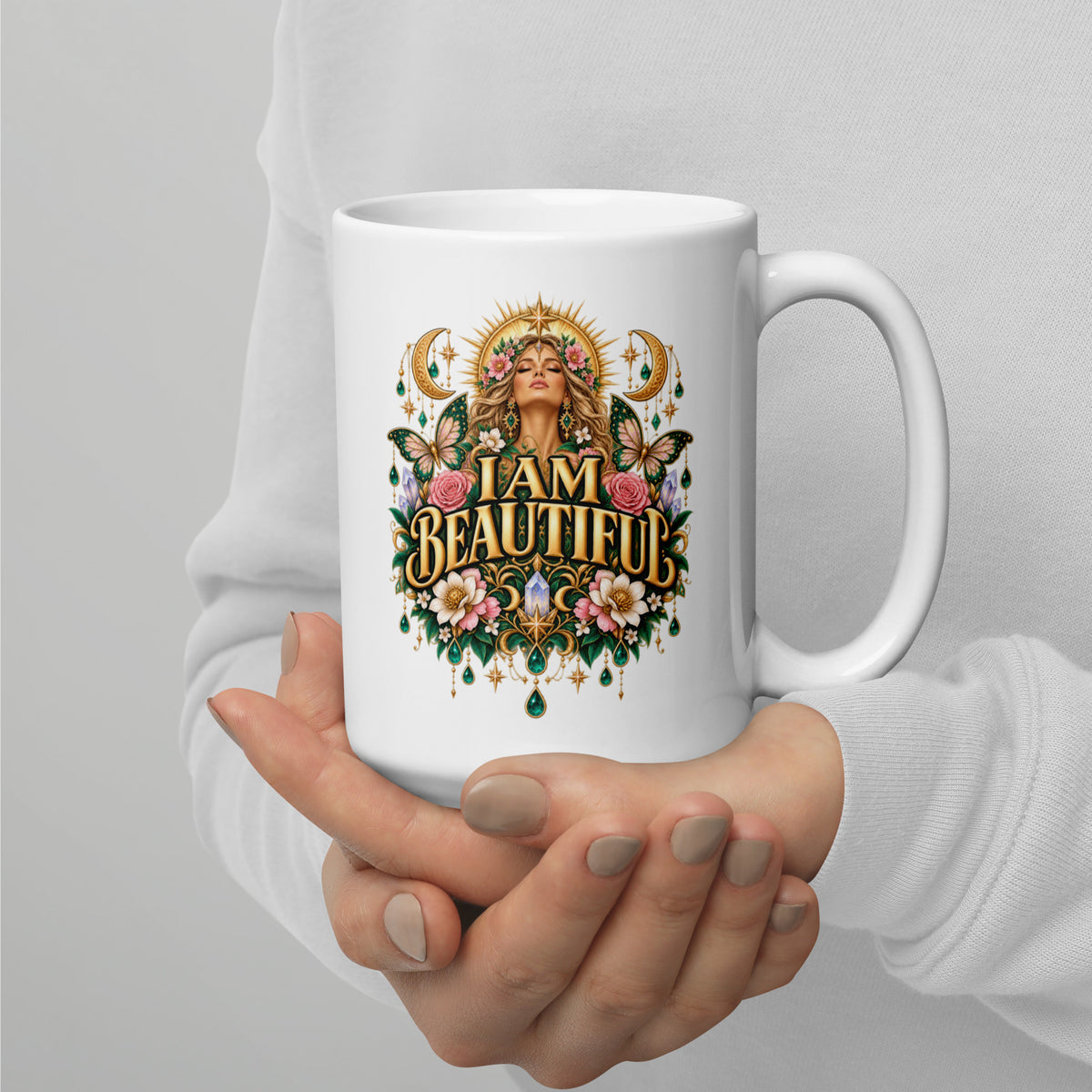 I Am Beautiful affirmation design with roses, butterflies and twin crescents in gold, on a white glossy mug, 15 oz, handle on the right