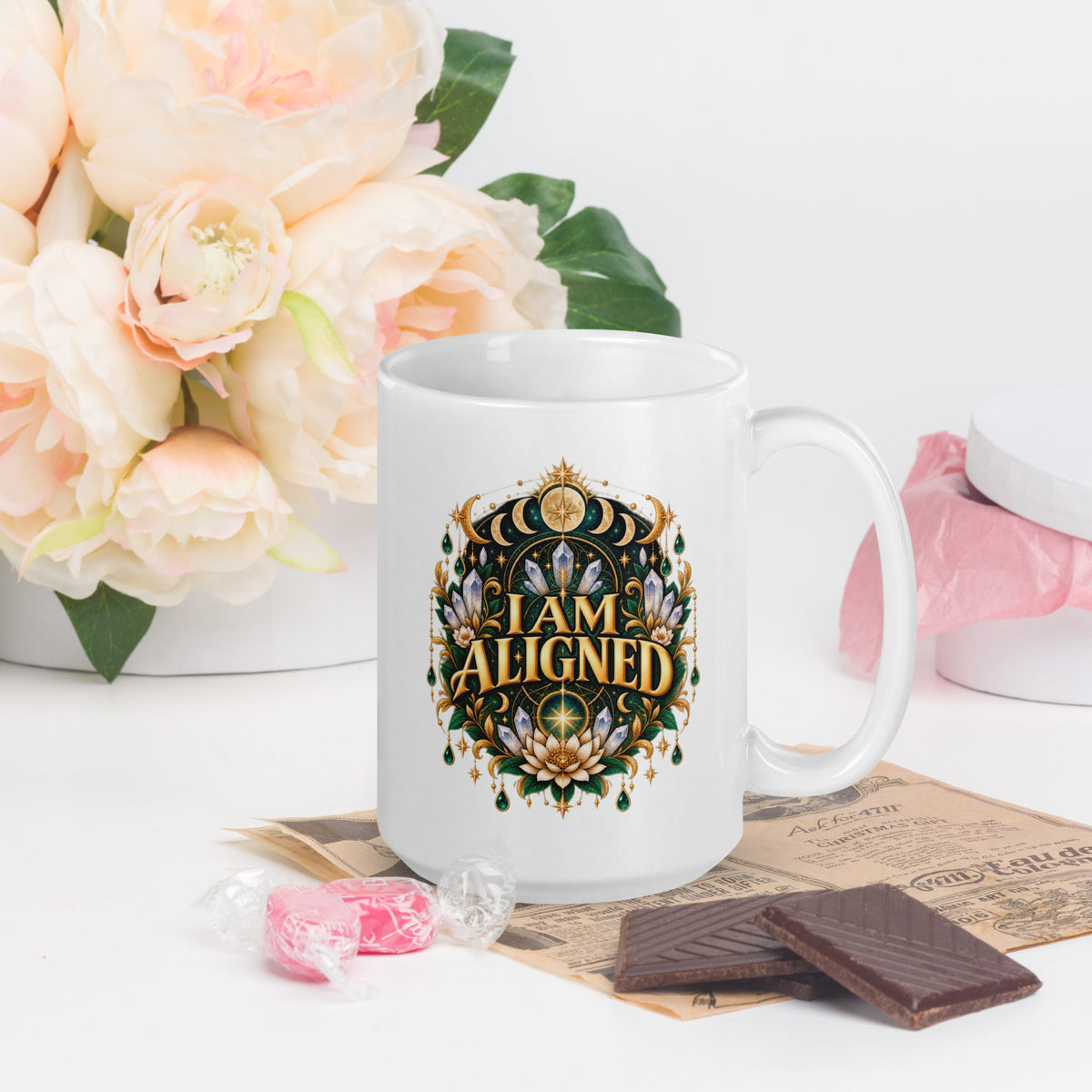 I Am Aligned affirmation design with a lotus, quartz and moon phases in gold, on a white glossy mug, 15 oz, handle on the right