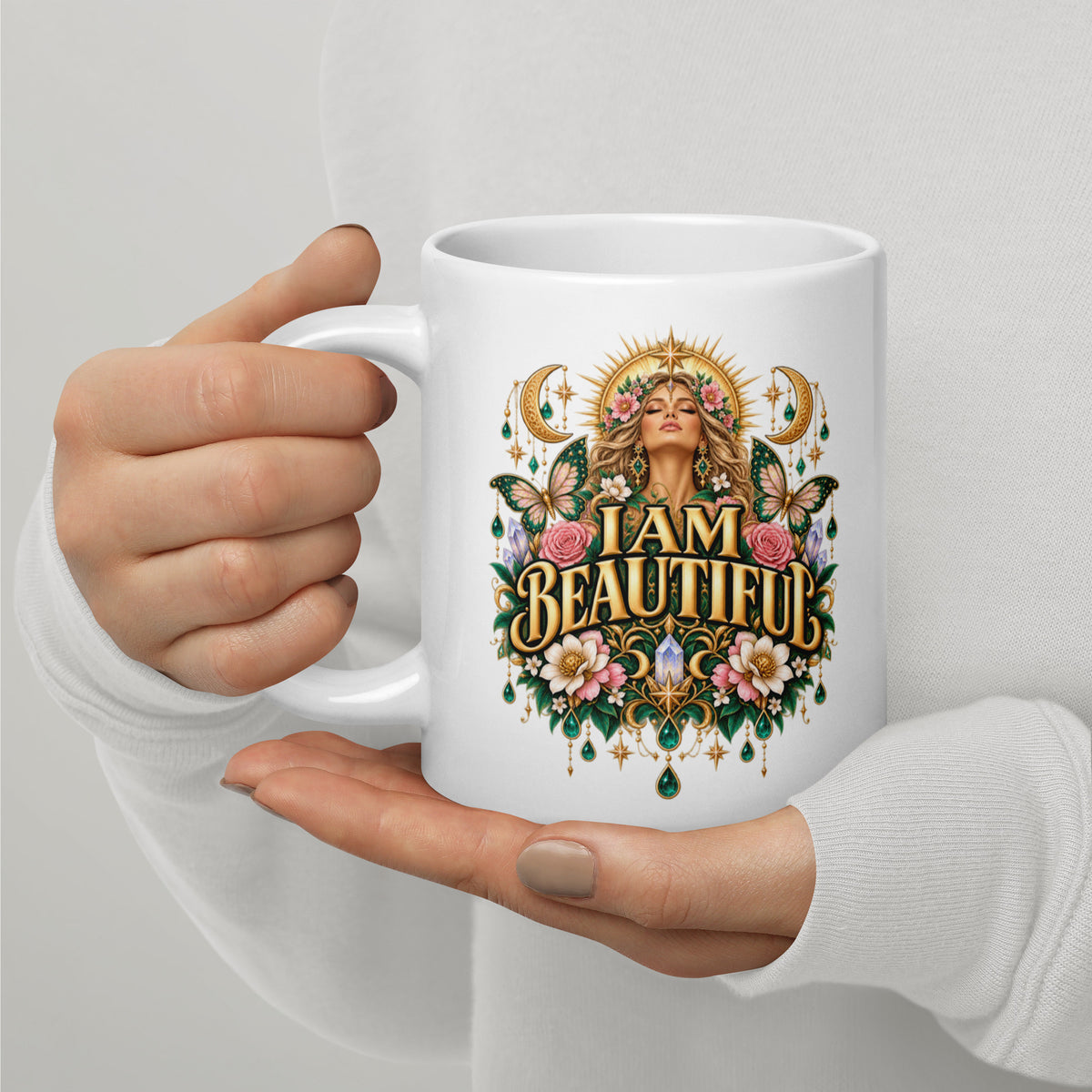 I Am Beautiful affirmation design with roses, butterflies and twin crescents in gold, on a white glossy mug, 20 oz, handle on the left