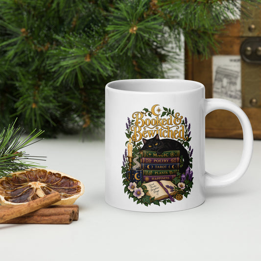 Booked and Bewitched dark academia design, a black cat asleep on a stack of spellbooks, on a white glossy mug, 20 oz, handle on the right