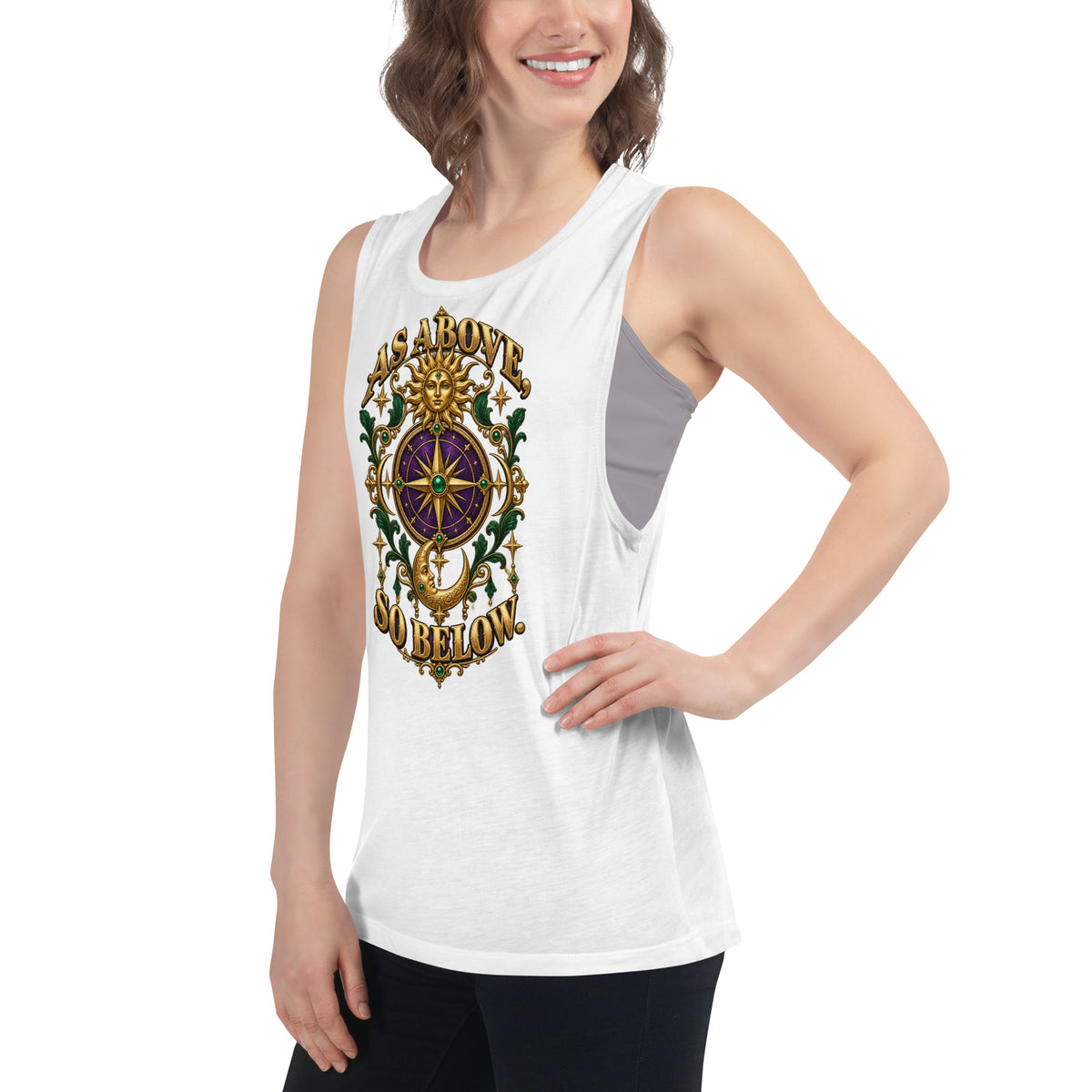 As Above, So Below astrology design, a gold sun face above a purple and gold compass rose with a crescent moon below, framed by emerald foliage, on a white ladies muscle tank, left front view