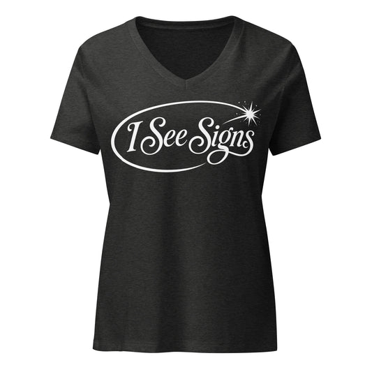 I See Signs design, the words set in black script inside a thin oval with a four-pointed star, on a dark grey heather women’s relaxed v-neck t-shirt, front view